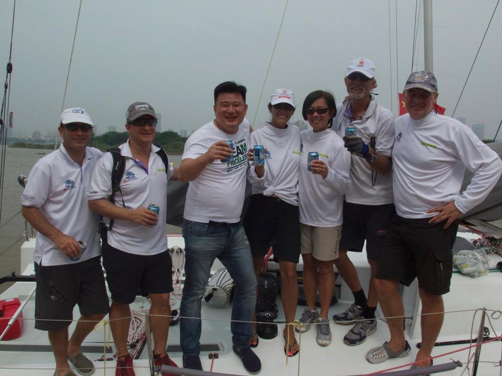 Tan Wei Zheng with the Calamani crew - XiangJiang Cup International Regatta 2015 © Suzy Rayment